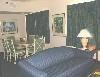 Shephard's Beach Resort, Clearwater Beach — Sunset Suite living and dining area.