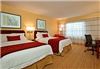 Courtyard Austin Northwest/Arboretum, Austin — Double/Double Guest Room - Enjoy complimentary high-speed wireless internet access, HBO, and pay-per-view channels in these special guest rooms. Each room also features coffee/tea service and a work desk. For the ultimate in comfort, we also offer down or foam pillows for a great night's rest.