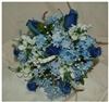 WeddingBouquets - Spokane, Spokane — This silk attendant's bouquet is designed with: rose buds, snapdragons, gypso, and starflower.