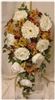 WeddingBouquets - Rapid City, Rapid City — This silk bridal bouquet is designed with: cabbage roses, open roses, mini roses, bouvardia or accent flowers, ivy and ribbons.