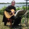 EAST END ENTERTAINMENT DJs/Bands/Strings., Westhampton Beach — Johnny Ray on vocals and acoustic guitar in Montauk
