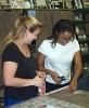 The Crossroads Art Center, The Crossroads Art Center, Richmond — Jenni Kirby works with a student.