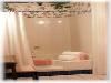 Central Park Bed And Breakfast, Louisville — Parkside Guest Room - sparkling white garden soaking tub w/shower.