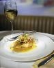 Pete’s Room, '21' Club, New York — Roasted Atlantic Cod with frisee and saffron cakes