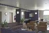 Summer Housing, Union College, Schenectady — Each floor offers guests a chance to unwind from the day's activities.  Amenities include a large screen TV with cable; comfortable, colorful sofas and chairs; small conference table; and kitchenette.