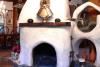 Casa De Luna Room, El Rocio Retreat, Mission — Free form fireplace in sunken living room off of the dining room and kitchen