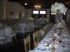 Queens Pavillion, Crown Winery LLC, Humboldt — The Queen's Pavilion is adjacent to the villa and the patio.  It has a rustic appeal with oak beam ceiling and views  of the vineyard.  A fireplace, bartending sink, and small state are inside. Seats 150-200 guests.