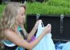 Treasures to Remember Photography & Designs, Murfreesboro — Senior dancer Abbie reminisces as she takes her first ballet costume out of a trunk filled with her costumes she wore throughout the years. A great senior portrait.