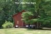 The "Red Shed", Footlight Ranch, Wellsville — The Little Red Shed provides rustic accomodations perfect for smaller parties of up to 75 people.Large windows on each side of "The Shed" create an open air atmoshpere that your guests are sure to love!