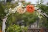 Beautiful Blooms by Larry, Carlsbad — Fresh Flower detail at top of wedding arch for outdoor 
wedding ....