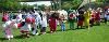 The Beach Waterpark, Mason — All of the mascots hold hands and walk from Sawyer Point to the racing area