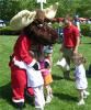 The Beach Waterpark, Mason — Miles offers a huge hug to cute girls awaiting the race