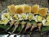Chef Tim's Table - Milwaukee, Milwaukee — Stuffed lamb chop popsicles, curry chicken salad in edible won ton cups and mini-sliders.