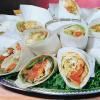 Red Hot & Blue - Cherry Hill, Cherry Hill — Red Hot and Blue Specialty Wraps for a lighter fare. Choose from:
• Vegetable Wraps...Flour tortillas filled with lettuce, vegetarian beans, cheddar cheese, red and green peppers and onions. Served in half with Garlic Ranch dressing.
• Garlic Chicken Wraps...Flour tortillas filled with Pulled Chicken, shredded lettuce and diced tomatoes. Served in half with Garlic Ranch dressing.
• Garlic Shrimp Wraps...Flour tortillas filled with grilled shrimp, shredded lettuce and diced tomatoes. Served in half with Garlic Ranch dressing.
Full platters serve 12, Half platters serve 6, Mini platters serve 3.