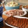 Red Hot & Blue - Cherry Hill, Cherry Hill — Double Trouble: Your choice of Two Red Hot and Blue's Slow-Smoked Meats and Two Homemade Southern Sides. Priced Per Person.