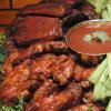 Red Hot & Blue - Irving, Irving — Red Hot and Blue's Award-Winning Ribs along with our tender Drummies and Wings tossed in our secret spicy sauce. Served with Bleu Cheese dressing, Red Hot and Blue Barbecue sauce, and celery sticks. Full platters serve 40-50, Half platters serve 20-25, Mini platters serve 10-15.
