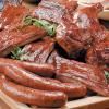 Red Hot & Blue - Irving, Irving — Tupelo Triple: Your choice of Three Meats and your choice of Two Homemade Southern Sides.Shown: Red Hot & Blue's Smoked Sausage, Award-Winning Ribs and Smoked Barbeque Chicken. Priced Per Person.