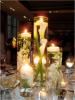 Enchanted Vizions, Houston — Cylinder Vases Centerpieces. Can be customized to go with your theme/color