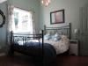 Cosy Woodpecker Cottage, Salt Spring Island — The soothing and relaxing blue bedroom.