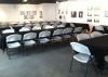 5 Hour Weekend Night Package, Gallery Black Lagoon, Austin — Photo of back room, seating area: works well for a setup of 50 to 70 people at tables with room for a cocktail lounge or dance floor in the front connected room. With all tables and chairs setup, max capacity is 100 people.