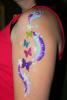 Clowns, Magicians & More, Winnipeg — Face painting and body art is brought to a whole new level with Clowns, Magicians & More's entertainers.  We can combine face painting with glitter in order to have your body art shine.  Let us get creative at your next event.