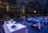 Entire Facility, Smooth Sailing Celebrations, a free nautical event planning service for 12 to 1,200 guests, Weehawken — Dining Deck with beautiful NYC skyline outside and the moon shining through the skytop windows.