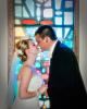 Jeff Coe Photography, Gardner — This photo of Bride and Groom sharing a kiss was taken at a small church in Raymore, MO.