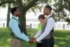 Cathy Bolkcom, Wedding Officiant, Davenport — An intimate wedding by the Mississippi River in Davenport, IA for Daniel and Ron. Iowa is a state where ALL couples can marry!