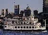 Empress Hornblower, Hornblower Cruises & Events, San Francisco — With an interior reminiscent of a turn-of-the-century paddlewheel riverboat the Empress Hornblower delivers a classic elegance. She provides the amenities of a luxurious banquet room with chandeliers, mahogany bars and dance floors. Like all royalty, this lady can handle black tie events but she is versatile enough to handle something a little more off beat like a Mariachi band and limbo contest on her expansive sundeck. The main deck seats 80 to 100 guests for dinner while the upper deck accommodates 60 to 70 guests.